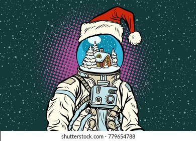 Christmas astronaut with dreams of gingerbread house. Pop art retro vector illustration.