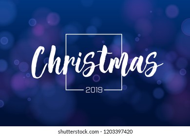 Christmas background 2019 with blue magic bokeh sparkle glitter lights. Abstract defocused circular New Year background design. Elegant, shiny, purple blue background. EPS 10