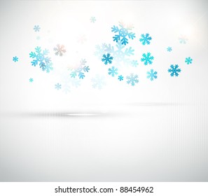 Christmas background with abstract winter blue snowflakes