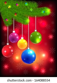 Christmas background with balls on a branch