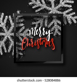 Christmas background, with beautiful bright snowflakes realistic shine glitter. In Framed calligraphy handmade. Merry Christmas poster, greeting card. Xmas decorations for the holidays