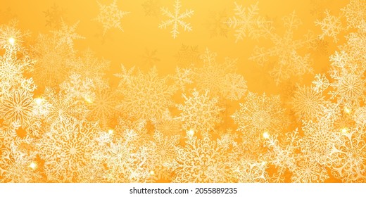Christmas background of big complex snowflakes in yellow colors