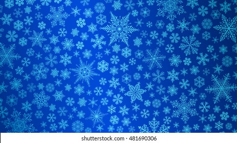 Christmas background of big and small snowflakes in blue colors