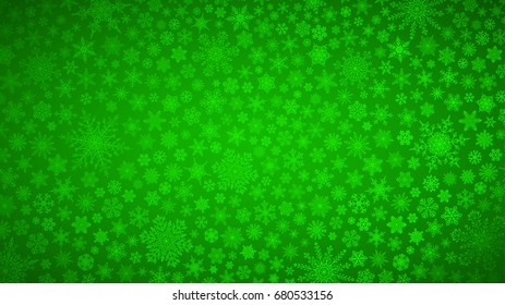 Christmas background of big and small snowflakes in green colors