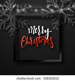 Christmas background black color with realistic garlands and beautiful snowflakes in the frame. Template christmas greeting card. Xmas Holiday and Happy New Year