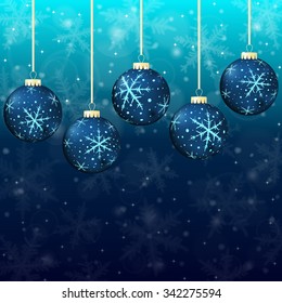 Christmas background with blue balls and snowflakes on dark blue background.