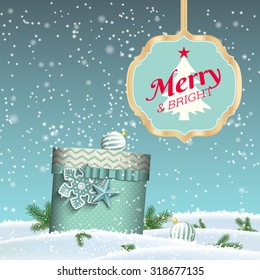 Christmas background with blue present in winter landscape and sign with text Merry and bright, seasonal greeting card, vector illustration, eps 10 with transparency and gradient meshes