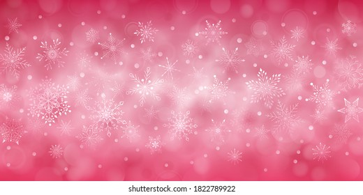 Christmas background of complex big and small falling snowflakes in red colors with bokeh effect