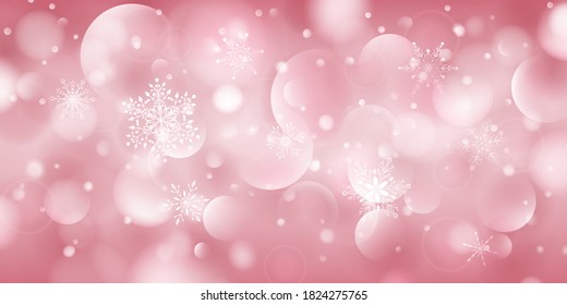 Christmas background of complex big and small falling snowflakes in pink colors with bokeh effect