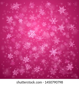 Christmas background of complex blurred and clear falling snowflakes in pink colors with bokeh effect