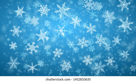 Christmas background of complex blurred and clear falling snowflakes in light blue colors with bokeh effect