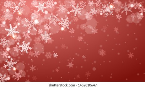 Christmas background of complex blurred and clear falling snowflakes in peach colors with bokeh effect