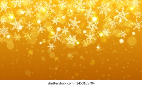 Christmas background of complex blurred and clear falling snowflakes in yellow colors with bokeh effect