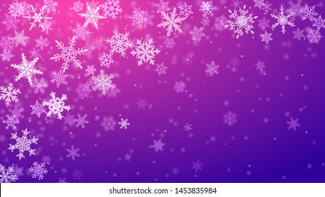 Christmas background of complex blurred and clear falling snowflakes in purple colors with bokeh effect