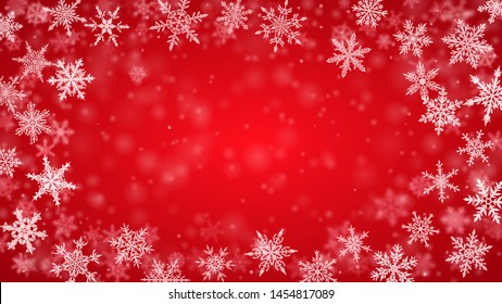 Christmas background of complex blurred and clear falling snowflakes in red colors with bokeh effect