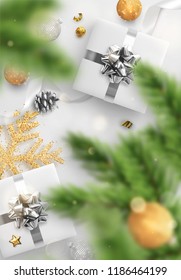 Christmas background. Christmas composition realistic decoration objects, gift box presents, confetti, snowflake and Xmas balls. Spruce branches pine cone. Bright festive design, greeting card.