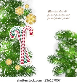 Christmas background with Christmas decor and green branches of Christmas tree.
