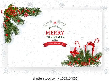 Christmas background with decoration and paper. Decorative Christmas festive background with Christmas balls stars and ribbons.