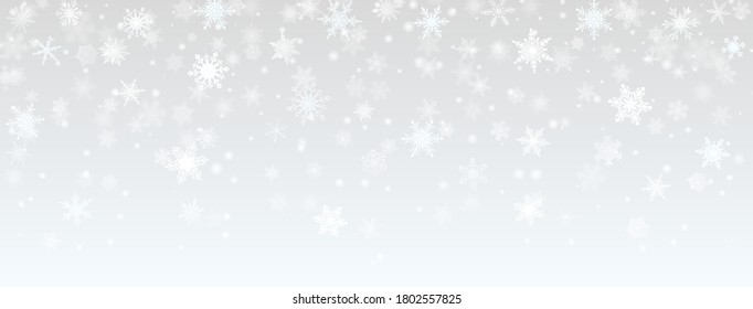 Weihnachtshintergrund fallender Schneeflocken in grauen Farben