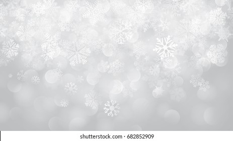 Christmas background of falling snowflakes in white colors with bokeh effect