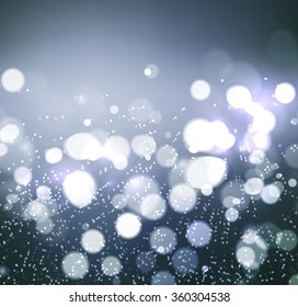 Christmas background. Festive elegant abstract background with silver bokeh  lights 