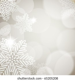 Christmas background with festive lights and snowflakes