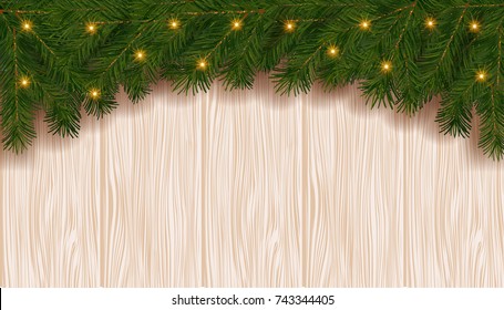 Christmas background with fir branch border and lights.Decorative Christmas festive background