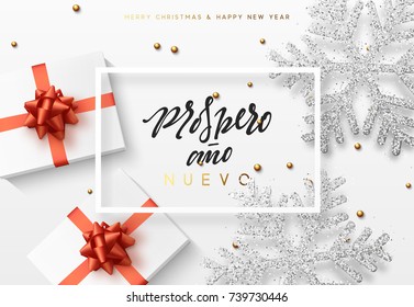 Christmas background with gifts box and shining snowflakes. Spanish text Prospero ano Nuevo