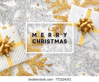 Christmas background with gifts box and shining golden and silver snowflakes. Greeting card lettering Merry Christmas. Vector Illustration.