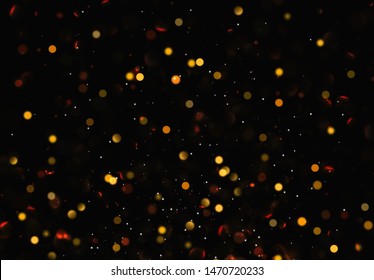Christmas background with golden lights bokeh. Night bright gold sparkles backdrop.
