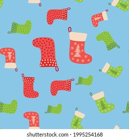 Christmas background with green, red stockings, wrapping paper and background image. Christmas stockings seamless pattern.