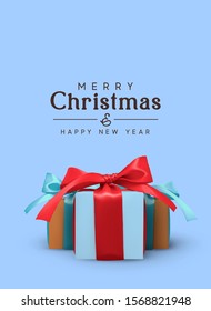 Christmas background with group of realistic gift boxes with red and blue ribbon bow. Xmas presents. Festive decorative objects.