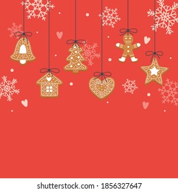 Christmas background with hanging gingerbread cookies