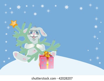 Christmas background with a hare and gift