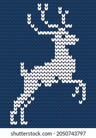 Christmas background. Knitted pattern
deer. Winter knitted pattern in blue tones.
