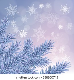 Christmas background with lacy snowflakes and fir branches