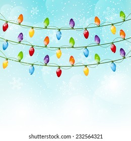 Christmas background with light bulbs