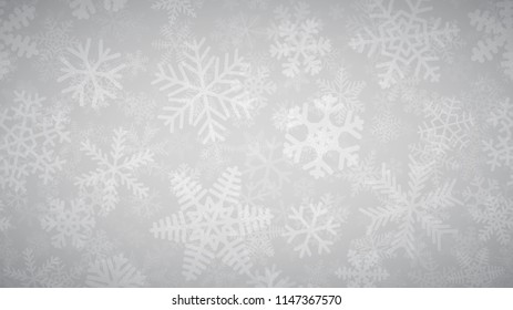 Christmas background of many layers of snowflakes of different shapes, sizes and transparency. White on light gray.