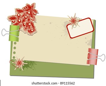 Christmas background with old spotted paper and paperclips