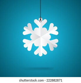Christmas background. Paper cut snowflake label. Vector