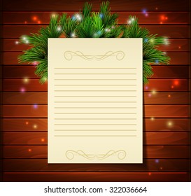 Christmas background with paper  and lights on a wood wall