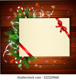 Christmas background with paper ribbon and lights on a wood wall
