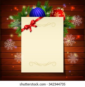 Christmas background with paper ribbon and lights on a wood wall and decorations