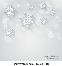 Christmas background with paper snowflakes.