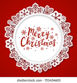 Christmas background with paper snowflakes round frame