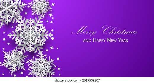 Christmas background of paper snowflakes with soft shadows, white on purple background