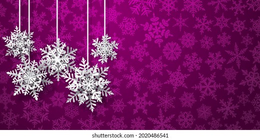 Christmas background of paper snowflakes with soft shadows, white on purple background with falling snow