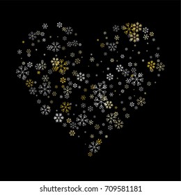 Christmas background with random scatter falling silver and gold snowflakes isolated on black.