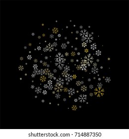 Christmas background with random scatter falling silver and gold snowflakes isolated on black.