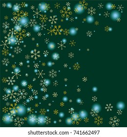 Christmas background with random scatter falling golden snowflakes and blue blurred lights on a dark green background.